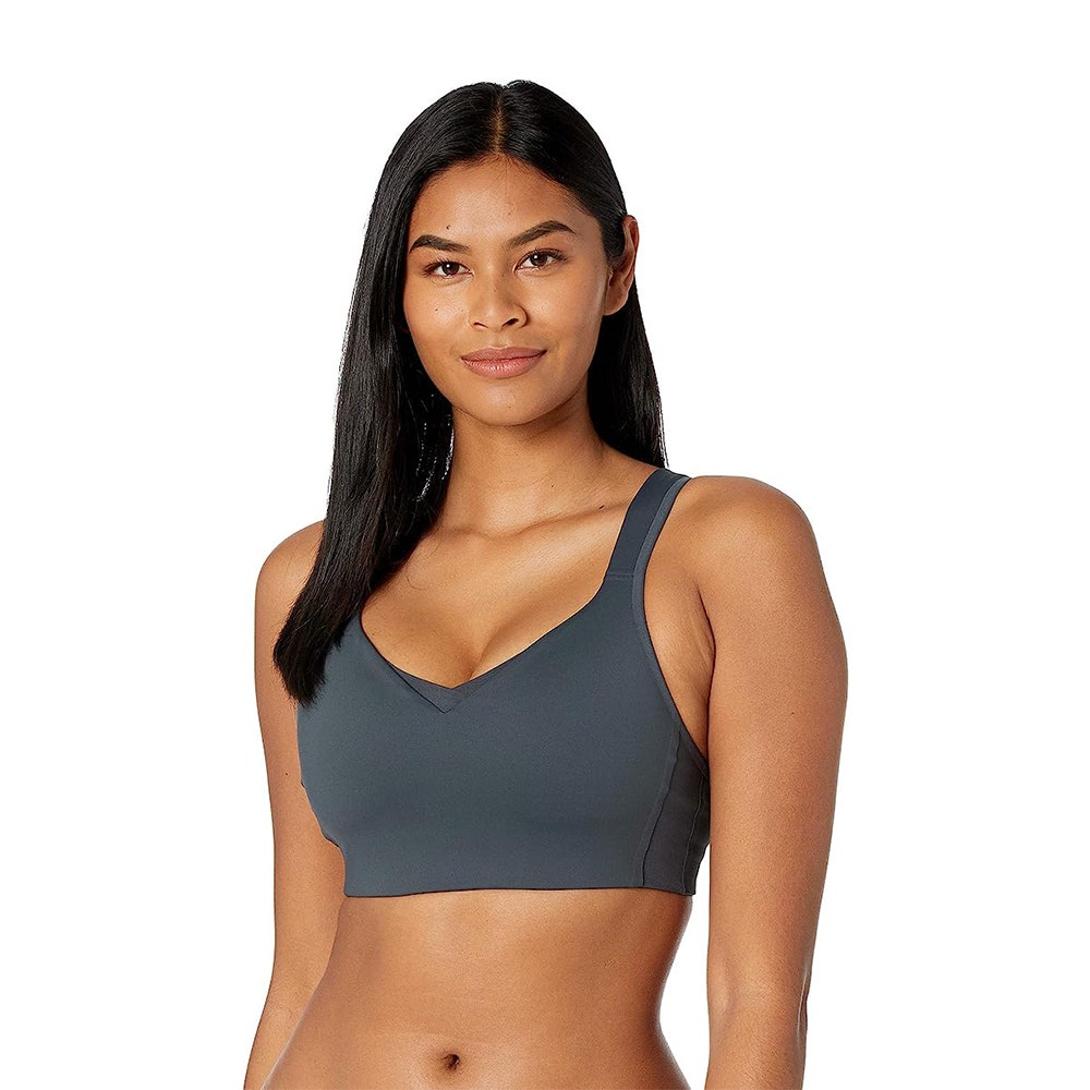 Woman wearing gray sports bra